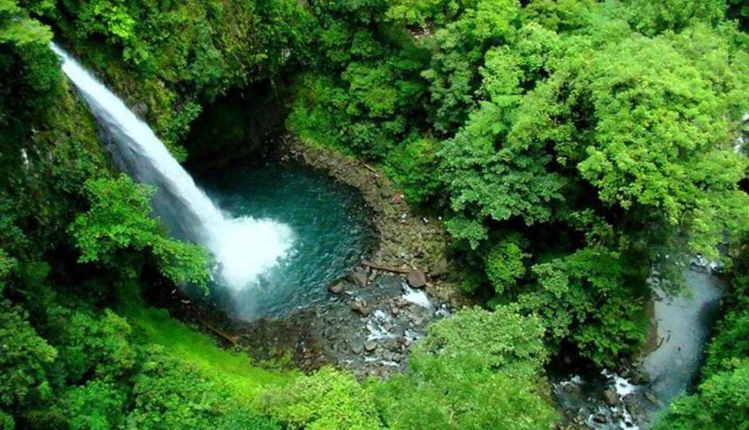 Ultimate Arenal Combo — Waterfall, Bridges, Volcano, Hot Springs & Lunch - Image 1